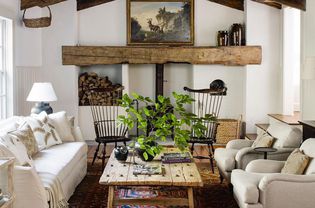Country living room with exposed wood ceiling.