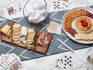 conversation cards, playing cards, and party snacks