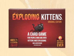Exploding Kittens Card Game displayed on a two-tone beige patterned background