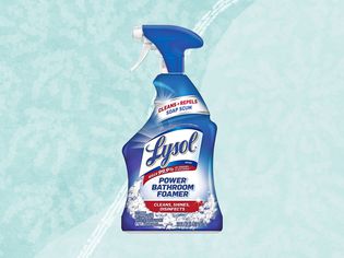 A bottle of Lysol bathroom cleaner on a blue background