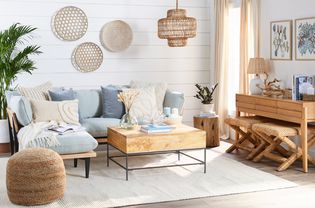A living room with coastal palette decor