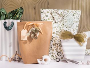 Frontal view of homemade gift bags made of wrapping paper