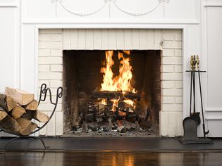 Fireplace with fire burning