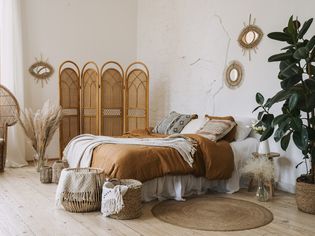 A messy boho style bedroom