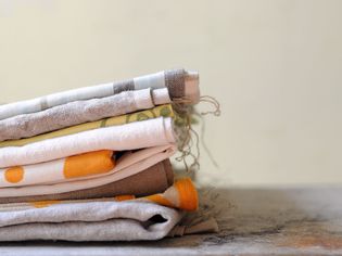 Stack of printed cotton kitchen towels