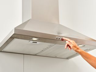 Range hood installed and turned on by hand