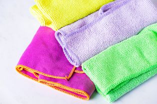 Brightly-colored microfiber towels folded closeup