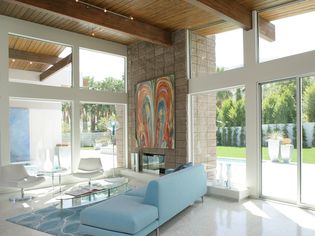 Contemporary Living room with floor to ceiling windows