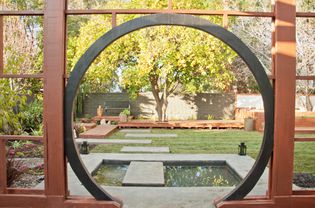 Zen garden with a circular gate