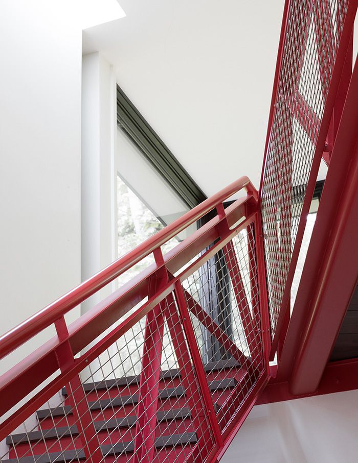 red metal stair railing