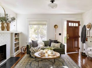 A staged living room featuring plants