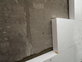 Rigid Foam Insulation on Concrete Wall