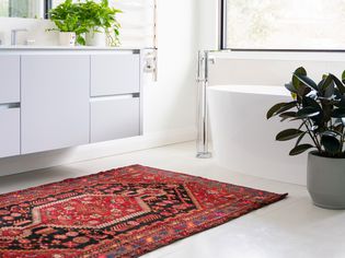 Persian rug on a bathroom floor