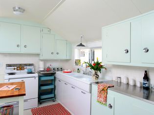 mint green midcentury inspired kitchen
