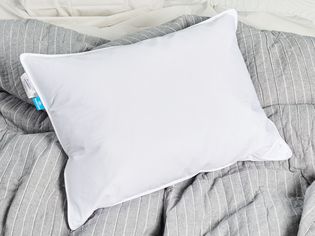 Slumber cloud core down alternative pillow on grey color blanket