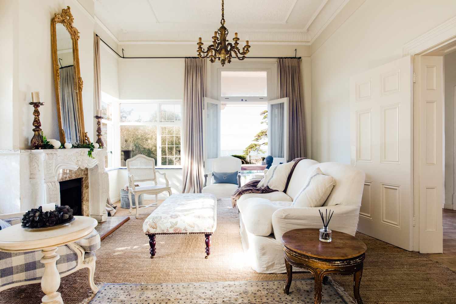 Traditional and elegant styled living room with neutral colors and architectural details