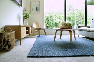 area rug used over a carpet