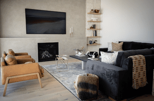 Black sofa in warm modern living room